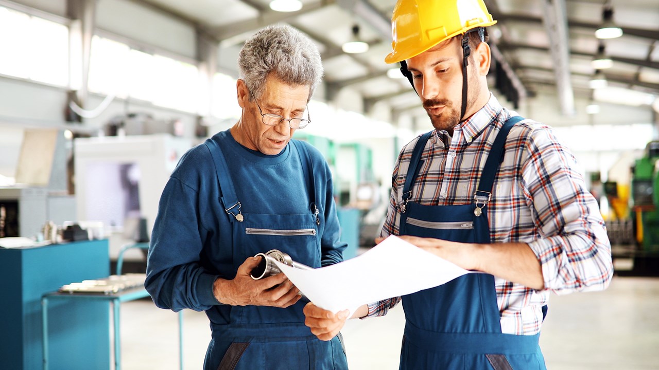 Engineer reading manual