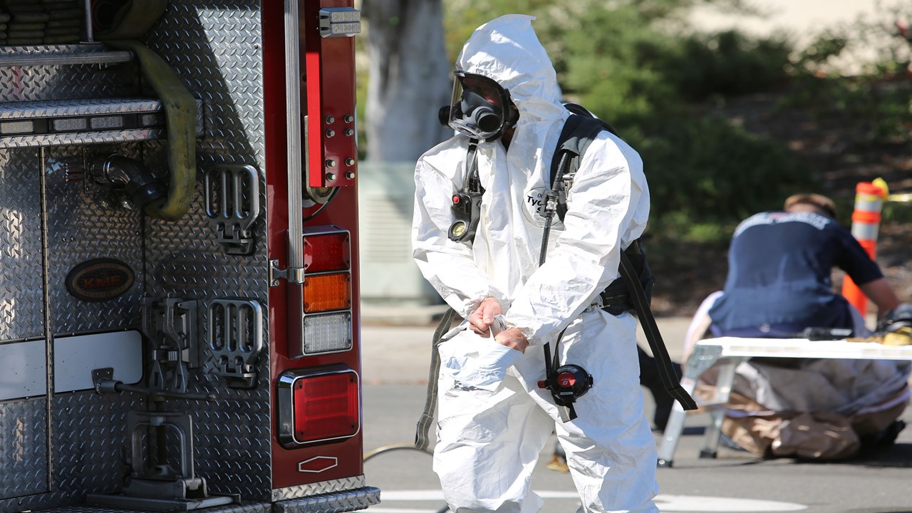 man wearing a hazmat suit